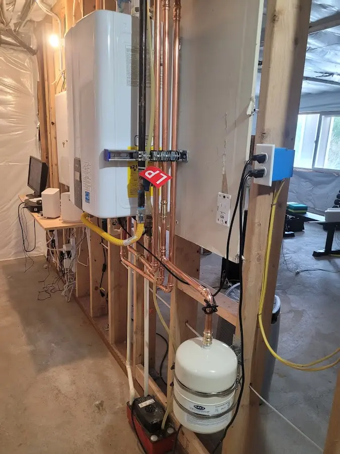 Licensed plumber repairing a kitchen sink in Travis Ranch